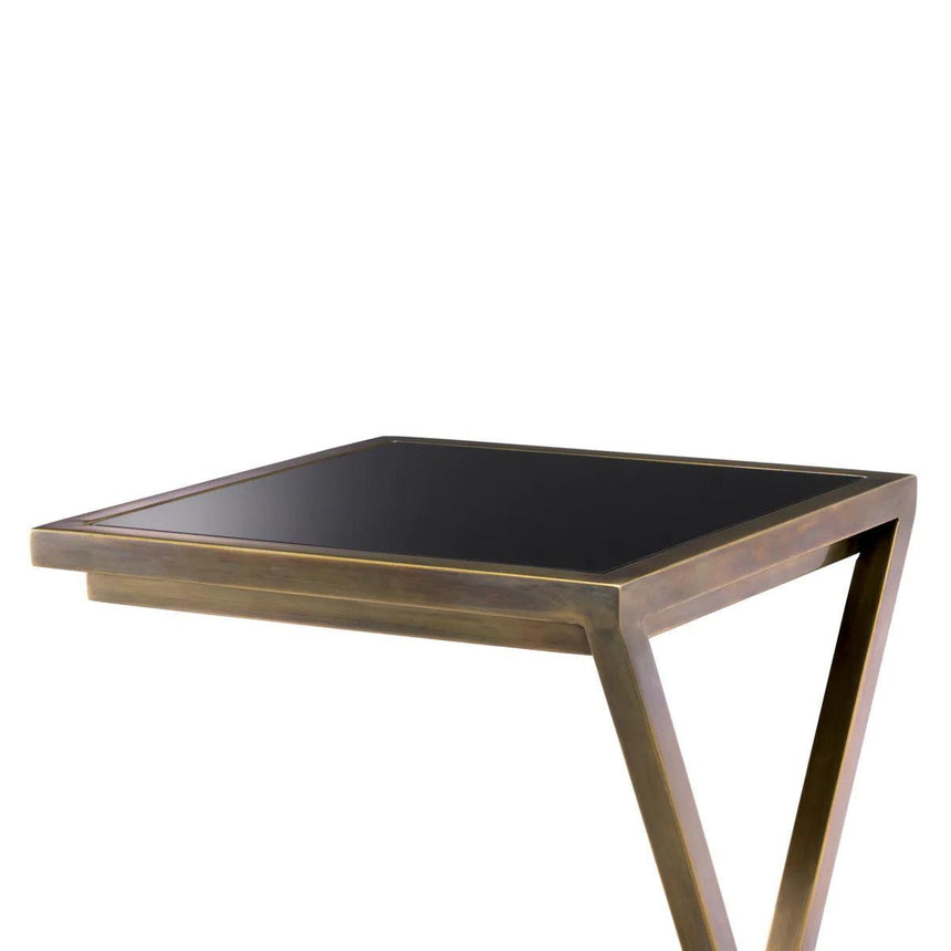Cross glass side table with brass legs