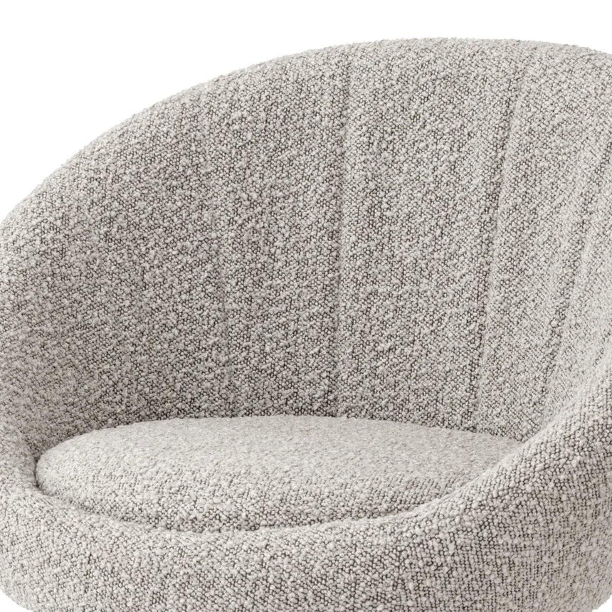 O'Neill swivel bouclé chair