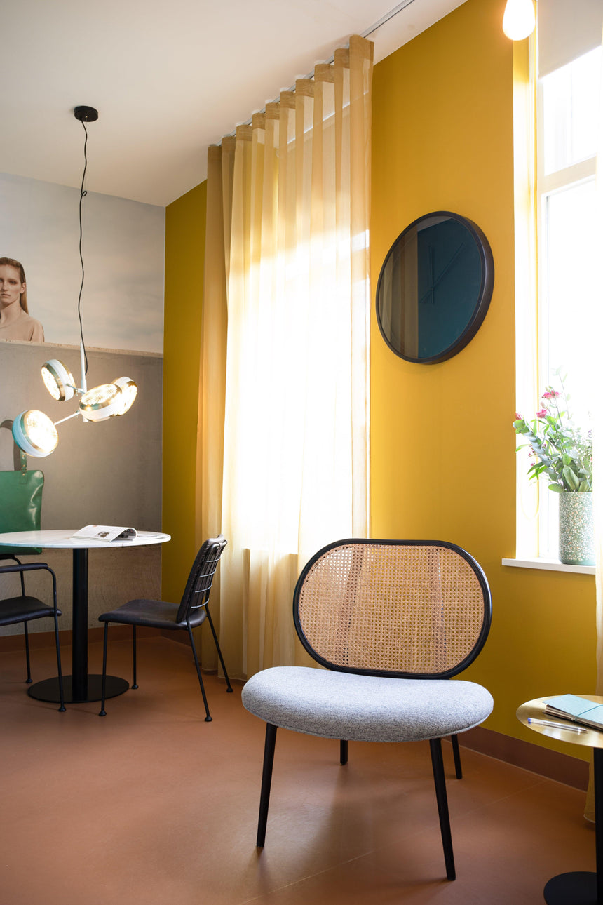 Spike rattan armchair