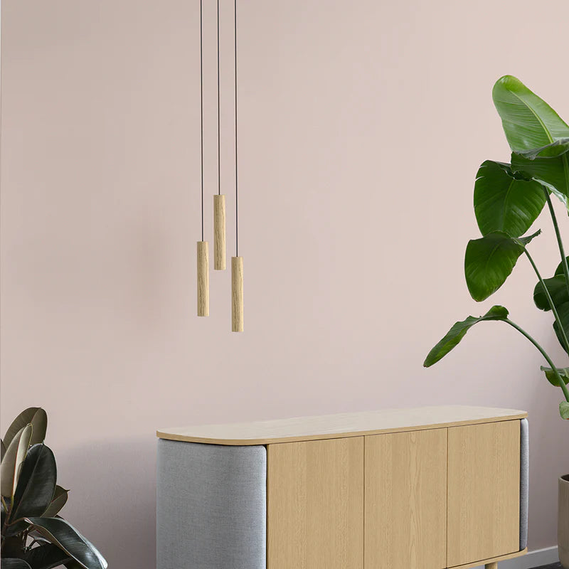 The Conversation Piece fabric armchair with natural frame