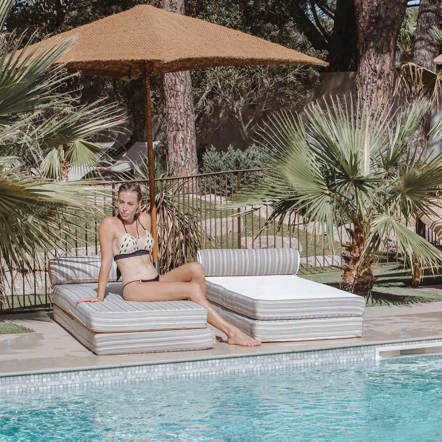 Double reversible fabric sun lounger with headrest