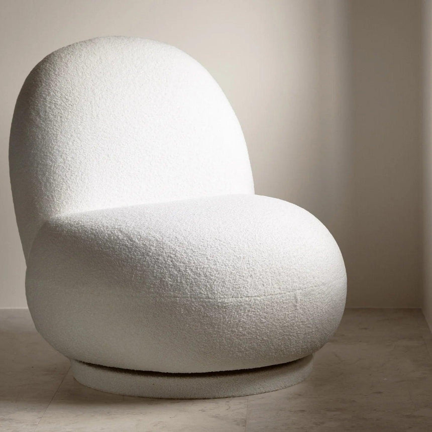 Chuck bouclé swivel armchair