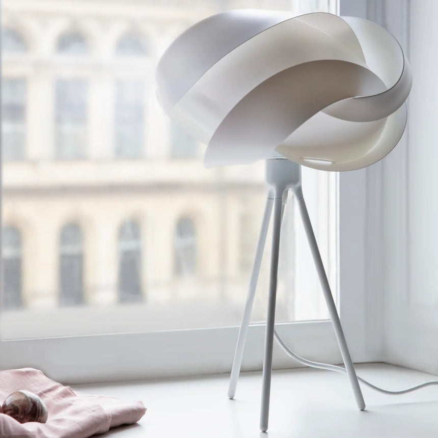 The Conversation Piece fabric armchair with natural frame