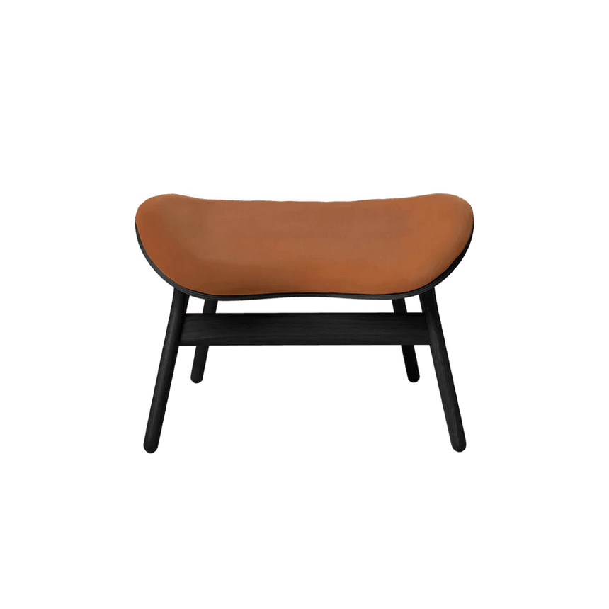 The Conversation Piece leather footstool with black frame