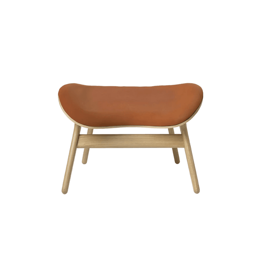 The Conversation Piece leather footstool with natural frame