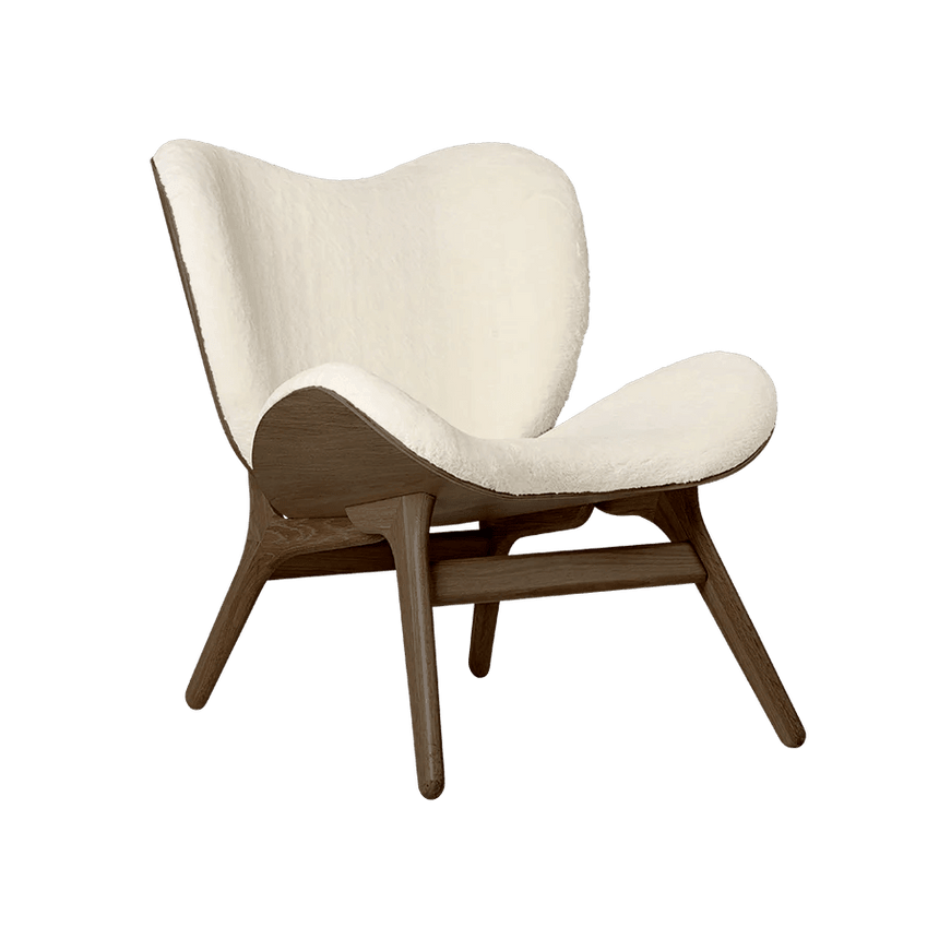 A Conversation Piece műszőrme fotel sötét kerettel