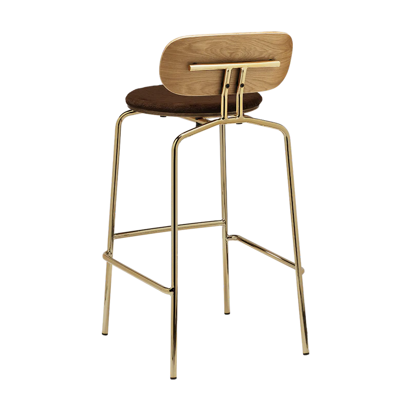 The Conversation Piece fabric armchair with natural frame