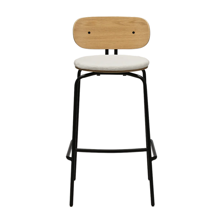 The Conversation Piece fabric armchair with natural frame