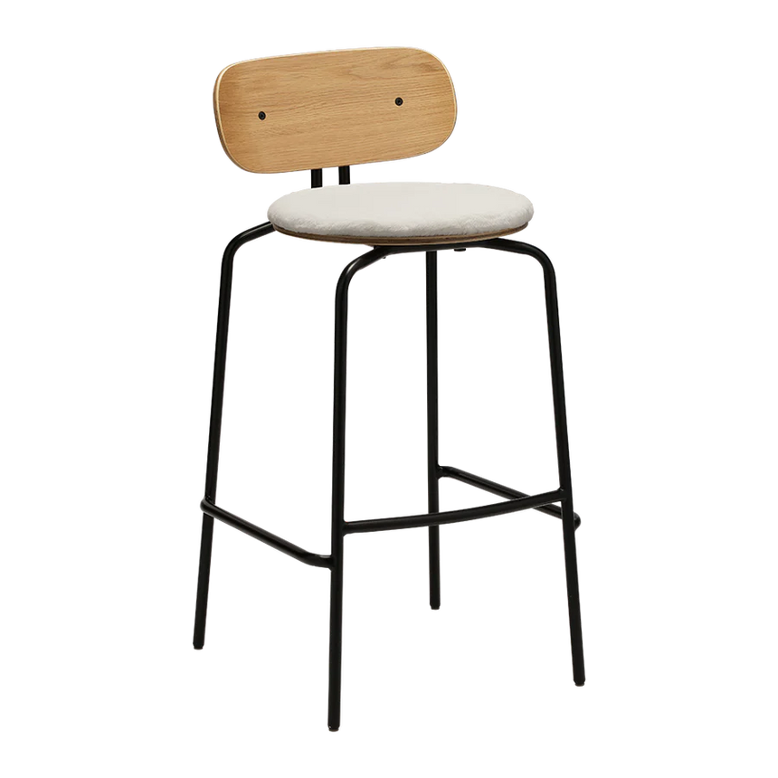 The Conversation Piece fabric armchair with natural frame