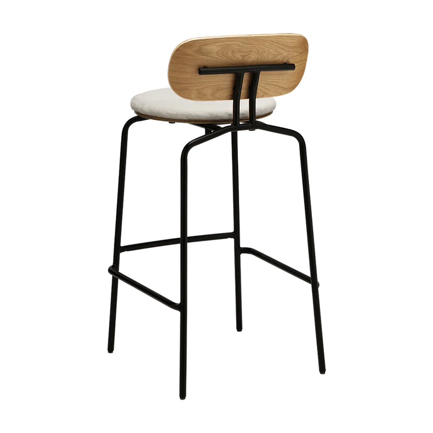 The Conversation Piece fabric armchair with natural frame