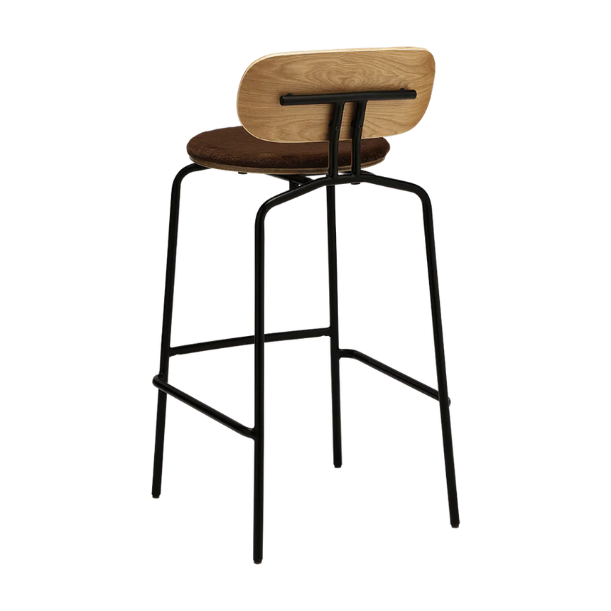 The Conversation Piece fabric armchair with natural frame