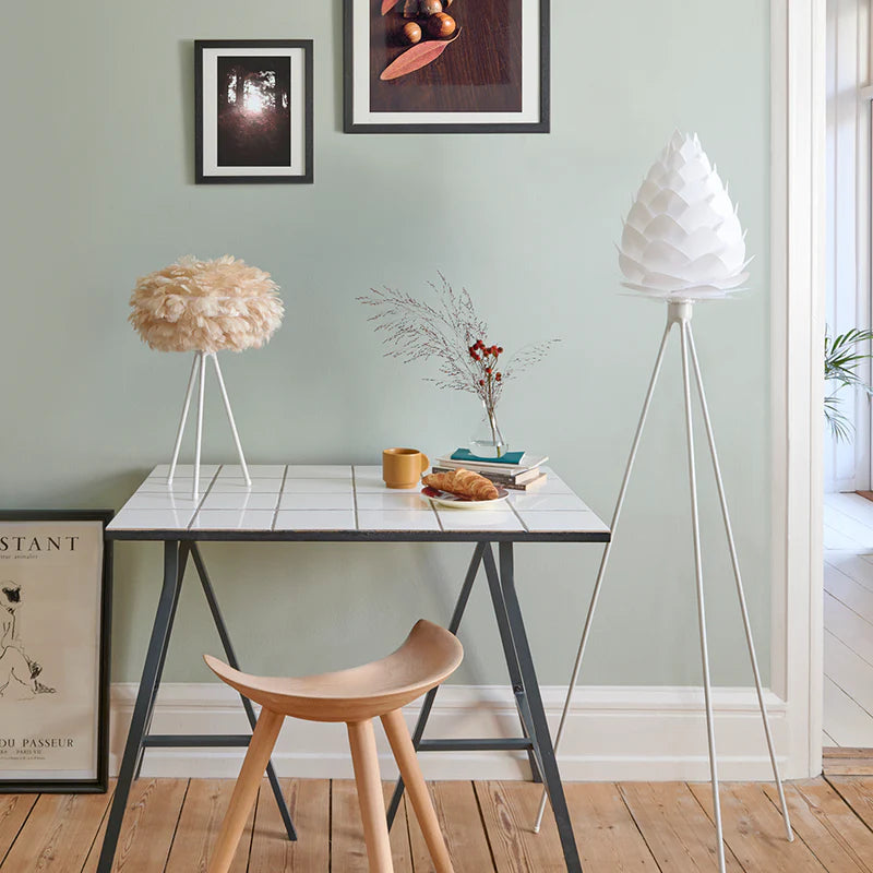 The Conversation Piece fabric armchair with natural frame