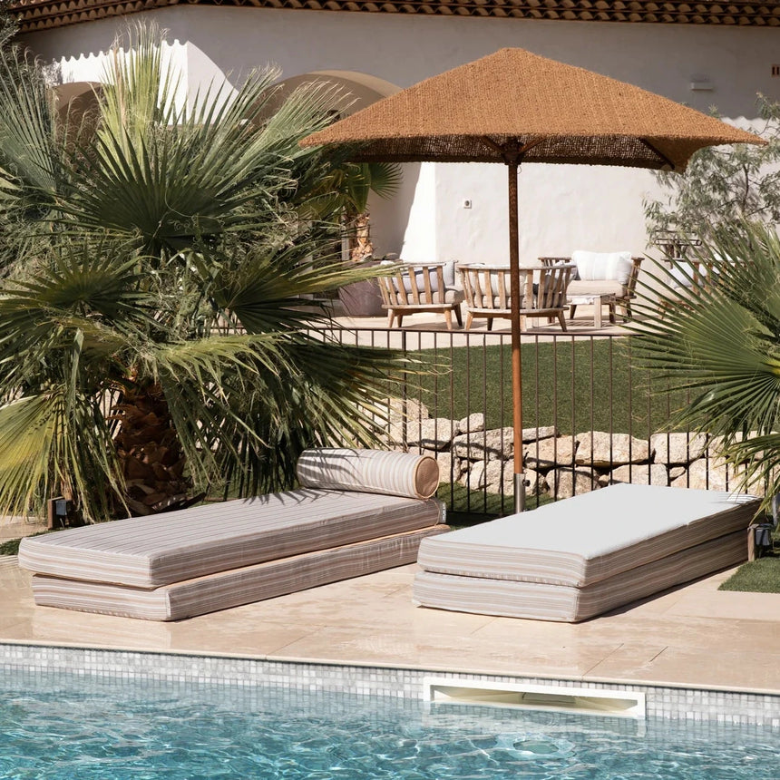 Double reversible fabric sun lounger with headrest