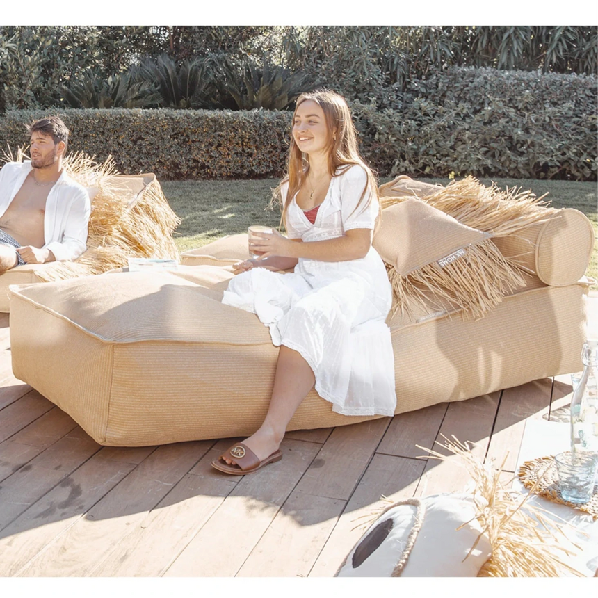 Raffia-effect floating fabric sun lounger with headrest