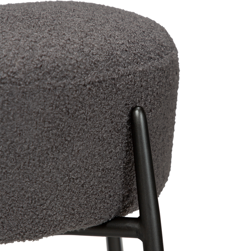 Orbit recycled bouclé low bar stool with antique legs