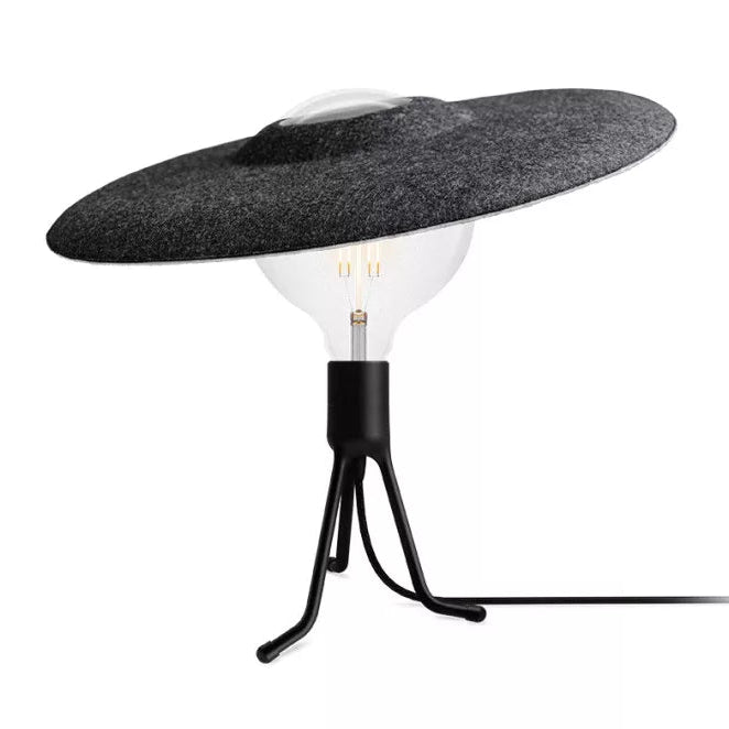 The Conversation Piece fabric armchair with natural frame