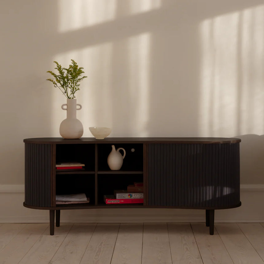 The Conversation Piece fabric armchair with natural frame