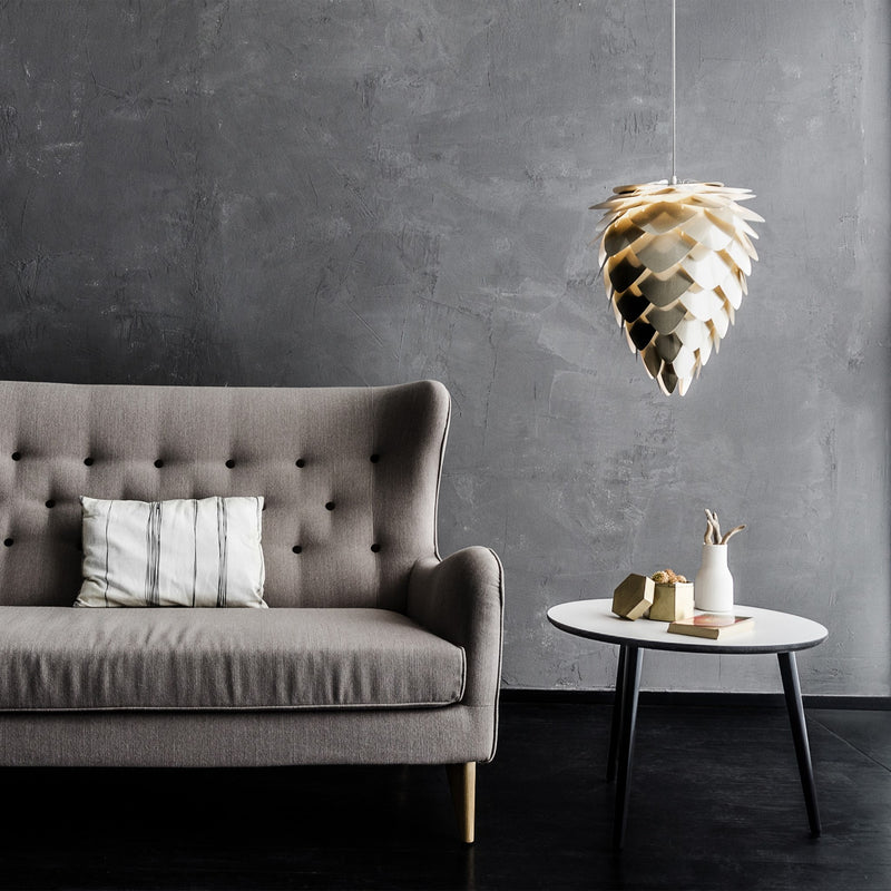 The Conversation Piece fabric armchair with natural frame