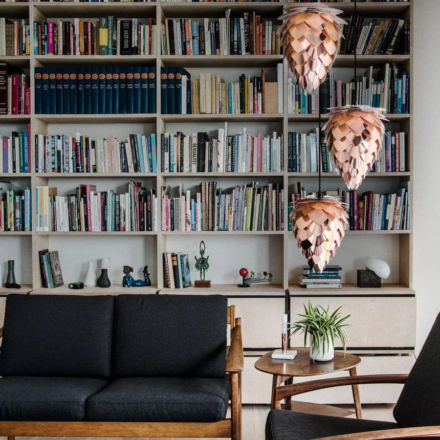 The Conversation Piece fabric armchair with natural frame