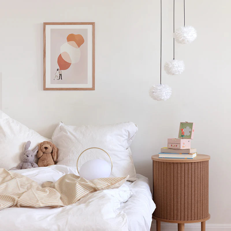 The Conversation Piece fabric armchair with natural frame