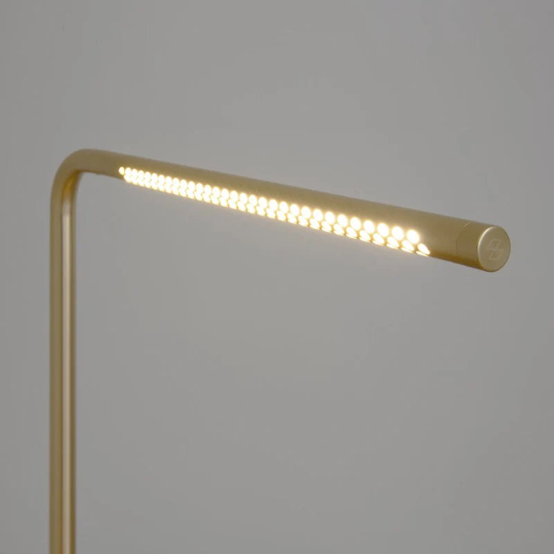 The Conversation Piece fabric armchair with natural frame