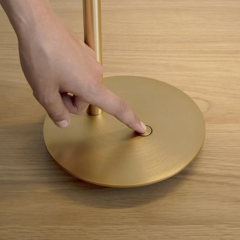 The Conversation Piece fabric armchair with natural frame