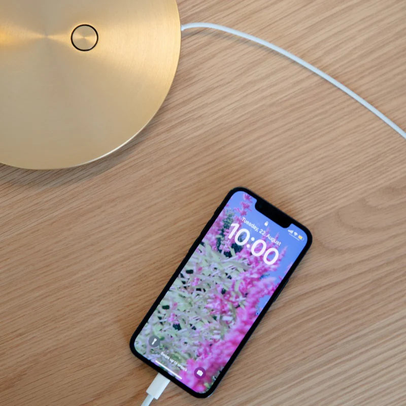 The Conversation Piece fabric armchair with natural frame