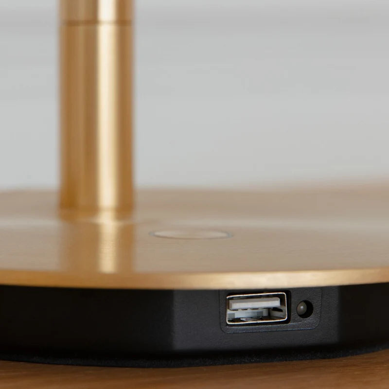 The Conversation Piece fabric armchair with natural frame