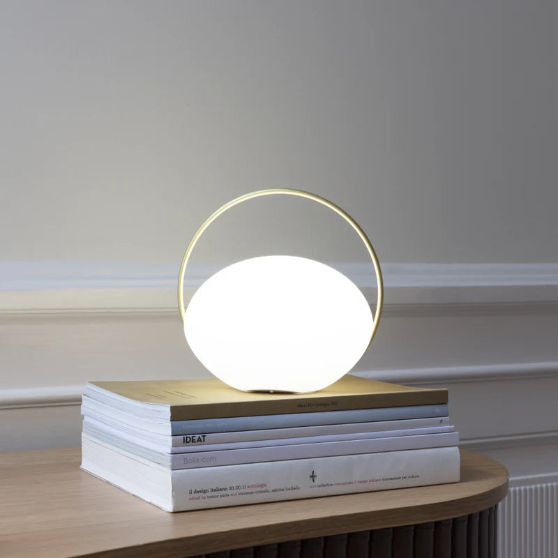 The Conversation Piece fabric armchair with natural frame