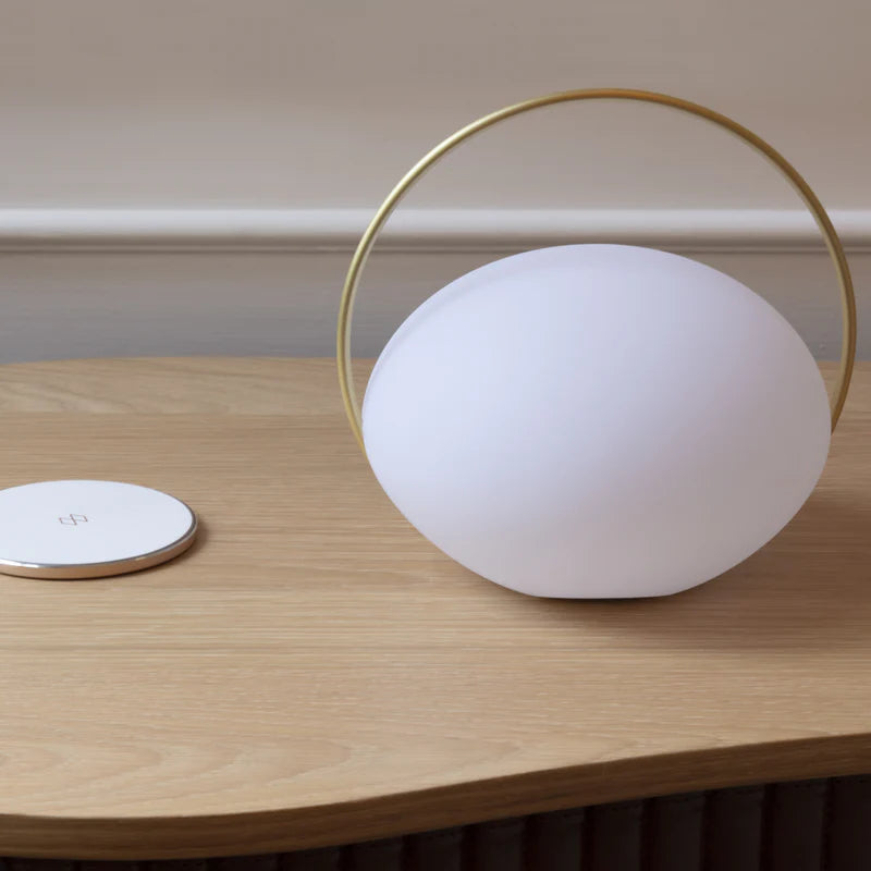 The Conversation Piece fabric armchair with natural frame