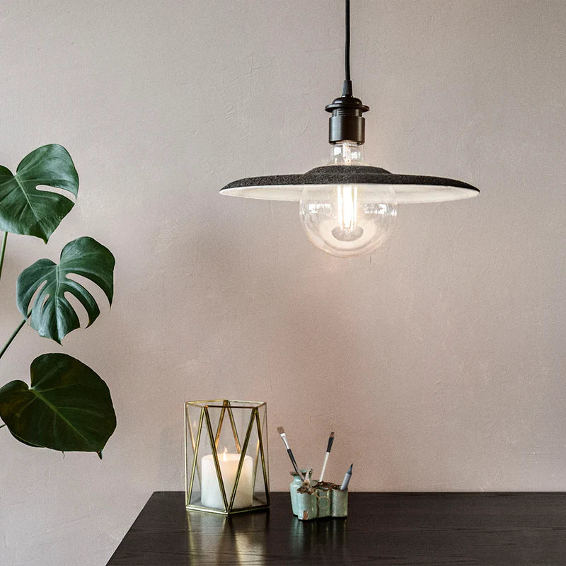 The Conversation Piece fabric armchair with natural frame