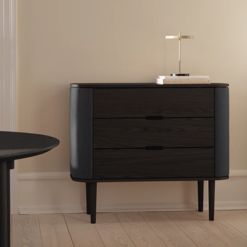 The Conversation Piece fabric armchair with natural frame