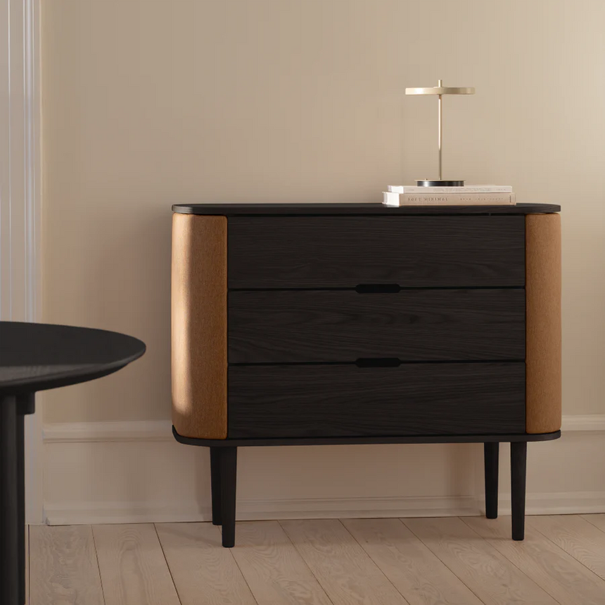 The Conversation Piece fabric armchair with natural frame