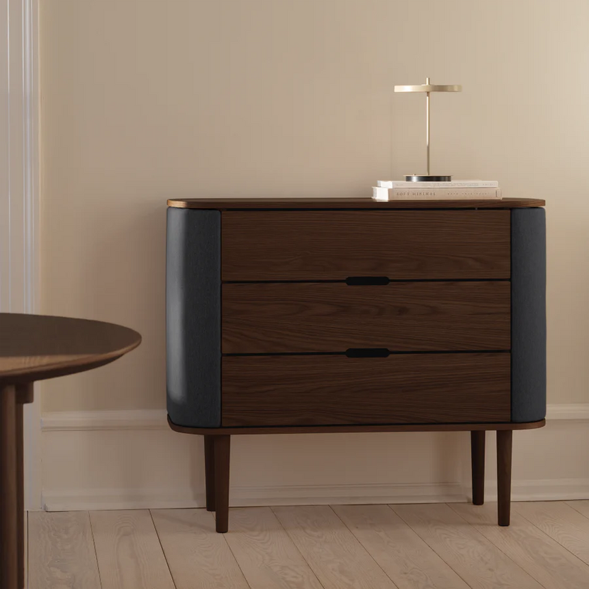 The Conversation Piece fabric armchair with natural frame