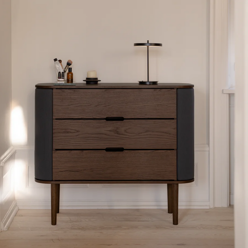 The Conversation Piece fabric armchair with natural frame