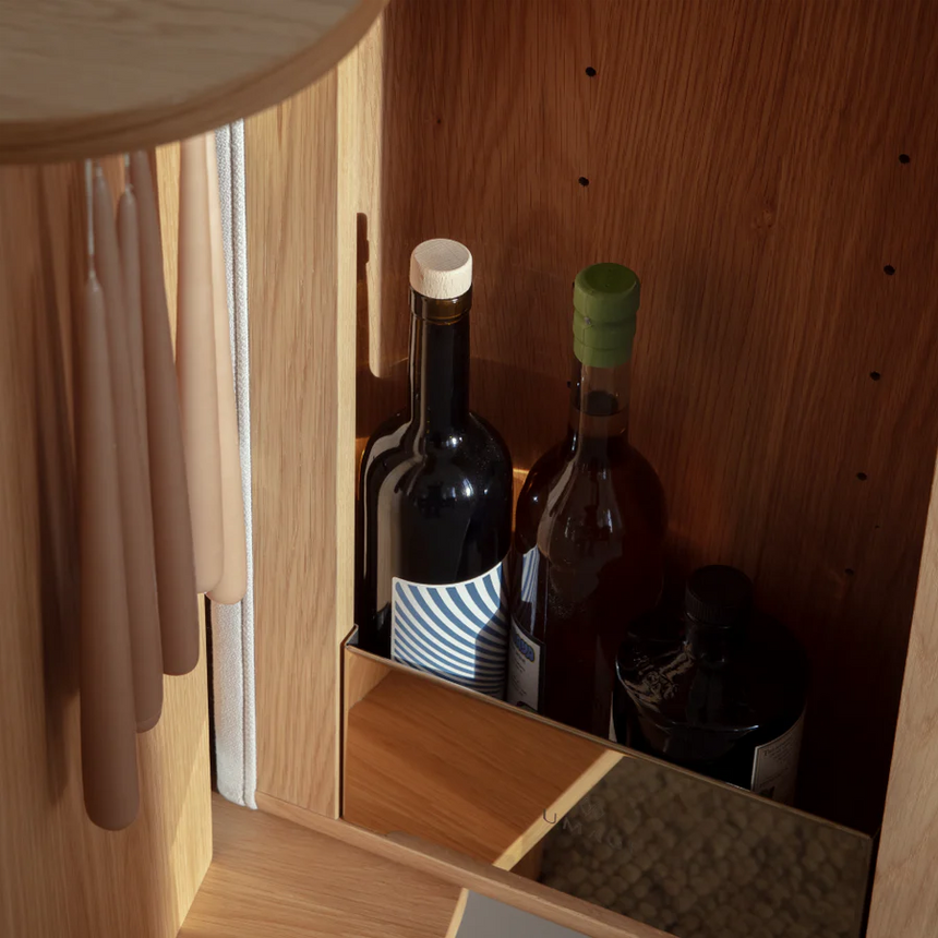 The Conversation Piece fabric armchair with natural frame