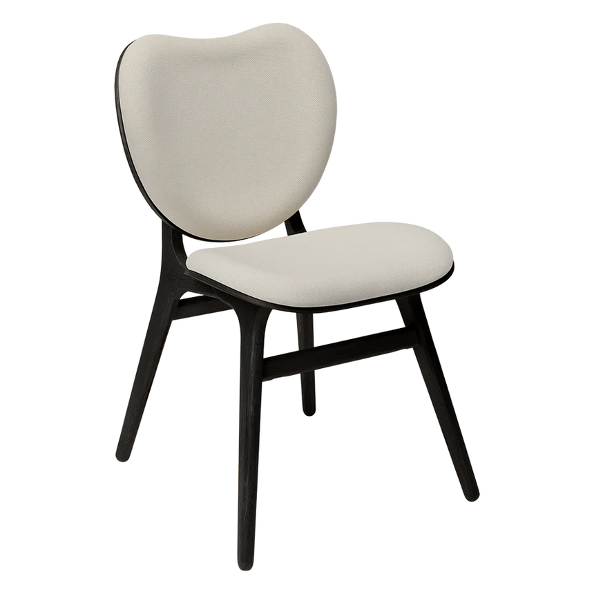 The Conversation Piece fabric armchair with natural frame