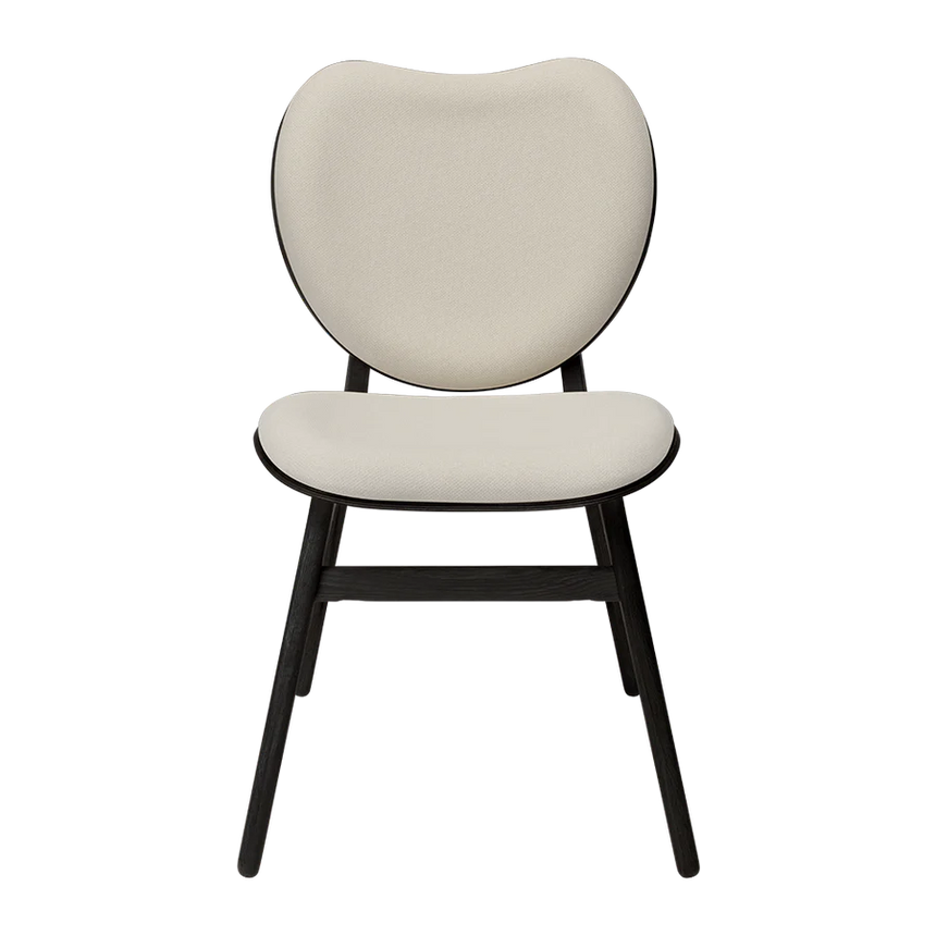 The Conversation Piece fabric armchair with natural frame