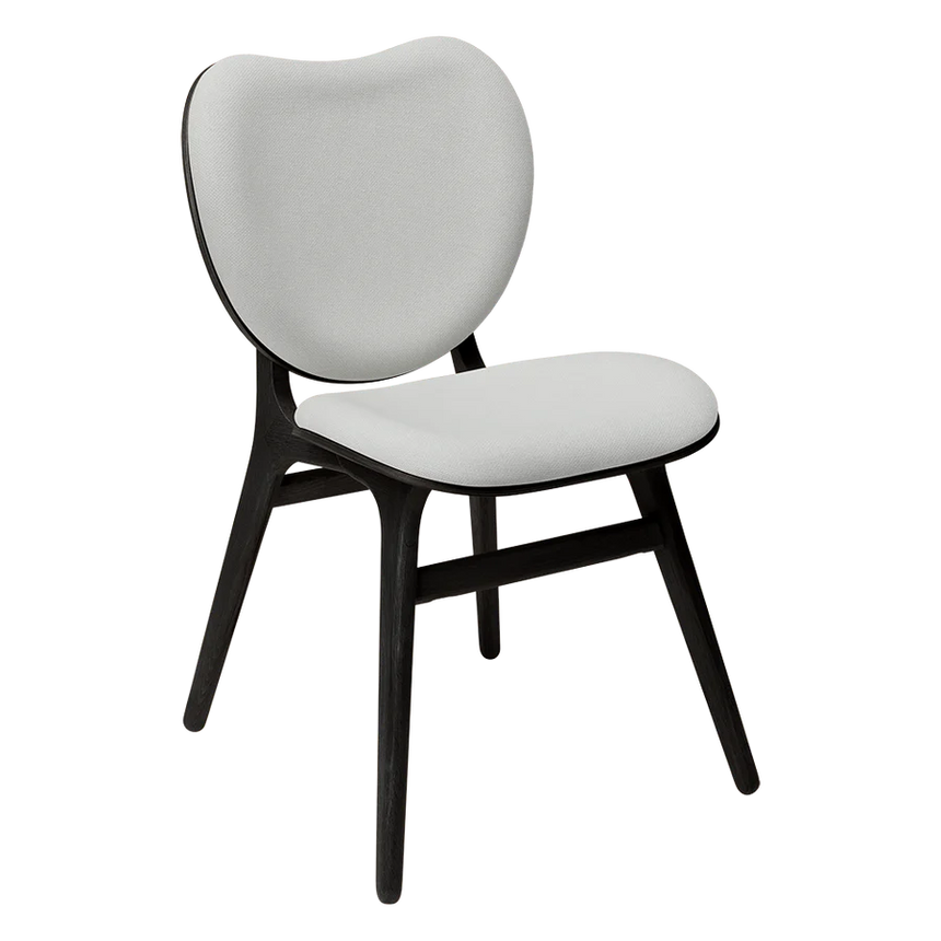 The Conversation Piece fabric armchair with natural frame