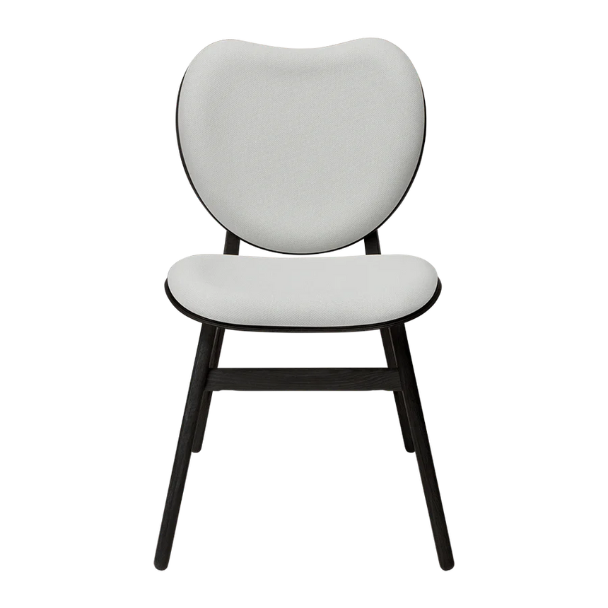 The Conversation Piece fabric armchair with natural frame