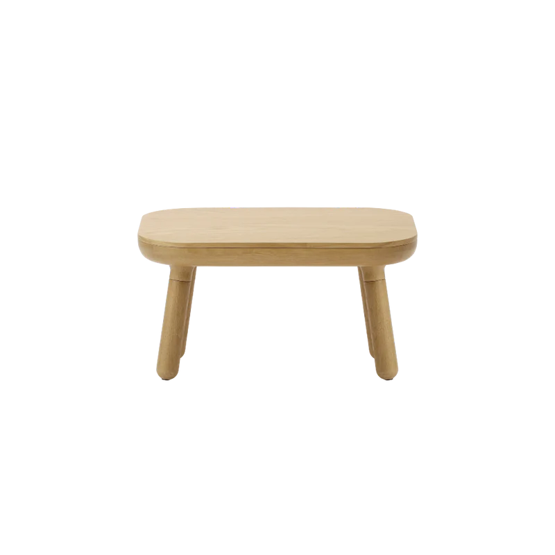 The Conversation Piece fabric armchair with natural frame