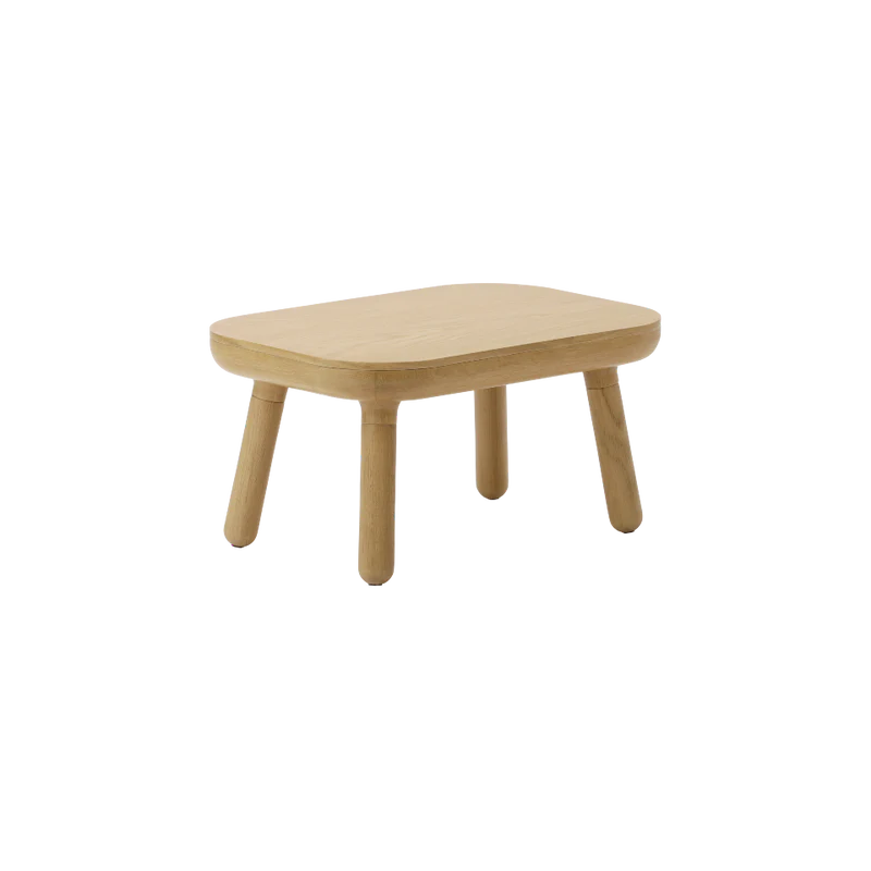 The Conversation Piece fabric armchair with natural frame