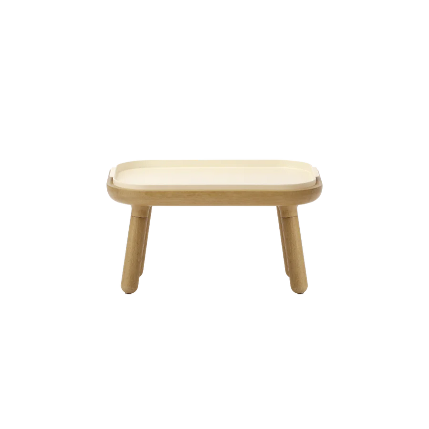 The Conversation Piece fabric armchair with natural frame