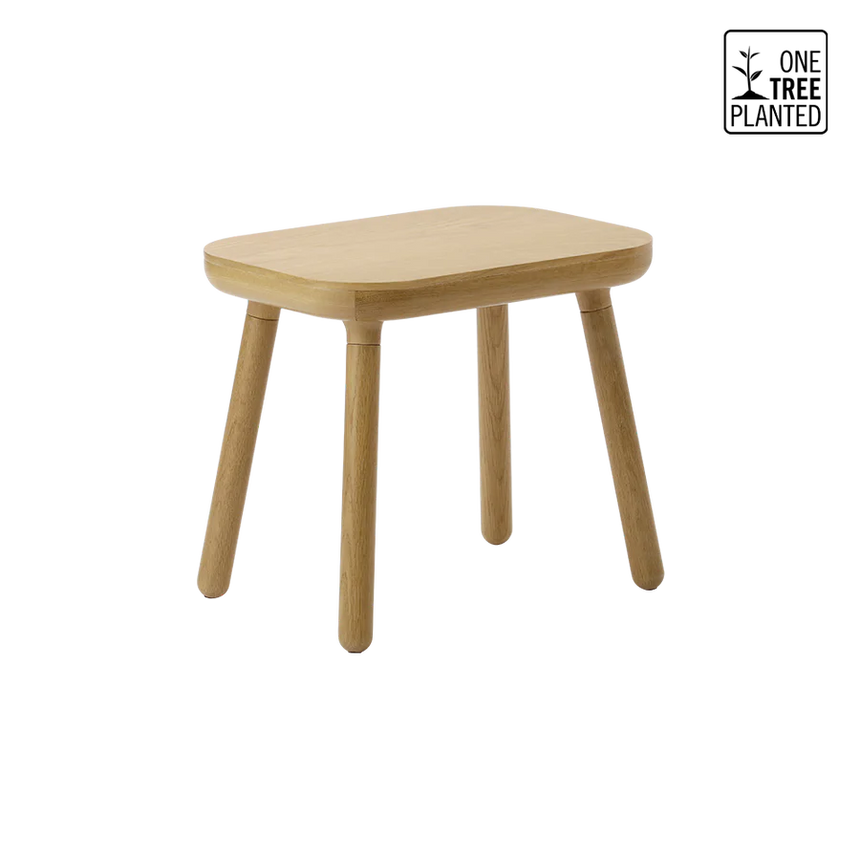 The Conversation Piece fabric armchair with natural frame