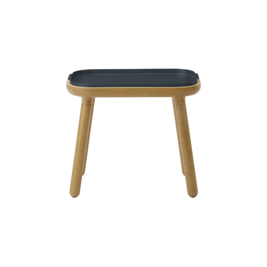 The Conversation Piece fabric armchair with natural frame