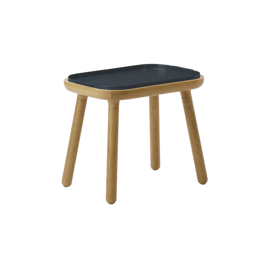 The Conversation Piece fabric armchair with natural frame