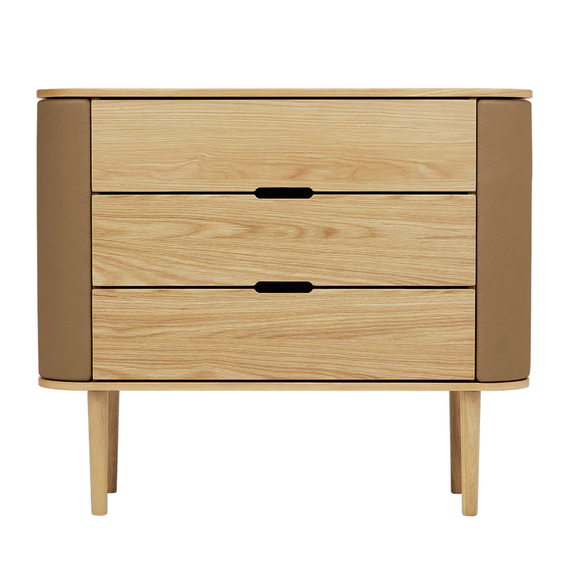 The Conversation Piece fabric armchair with natural frame