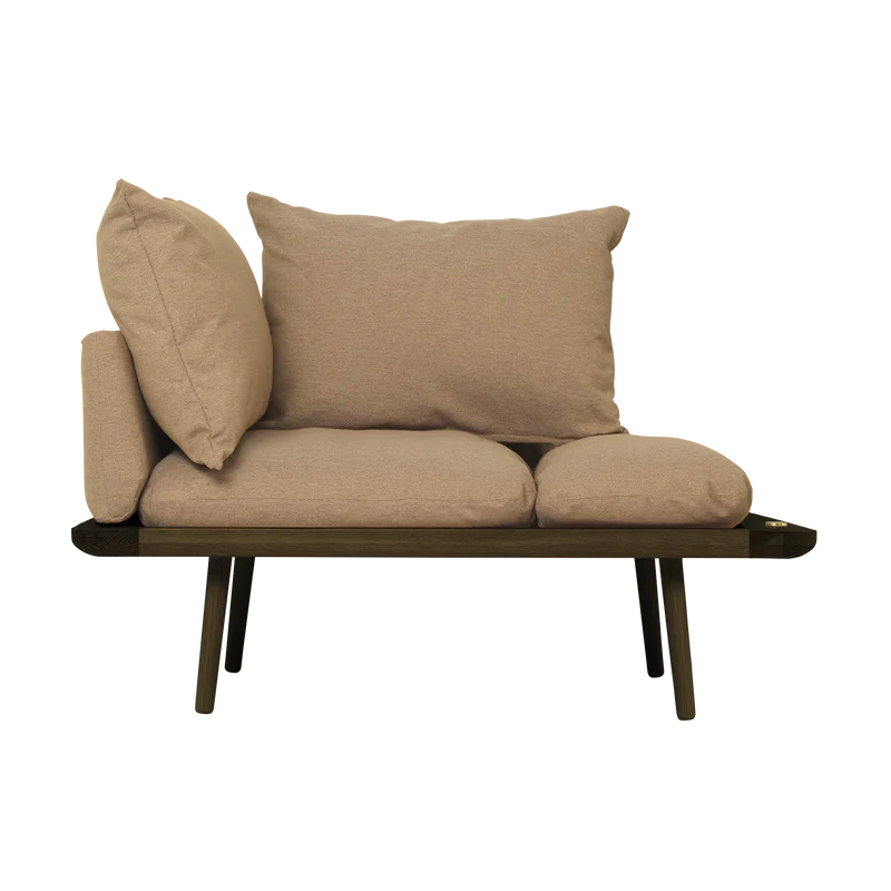 The Conversation Piece fabric armchair with natural frame