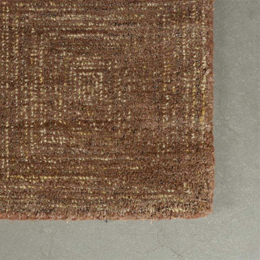 Maroon fabric rug