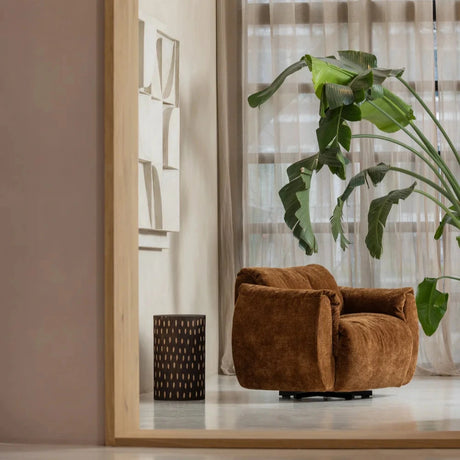 Baggy chenille swivel armchair